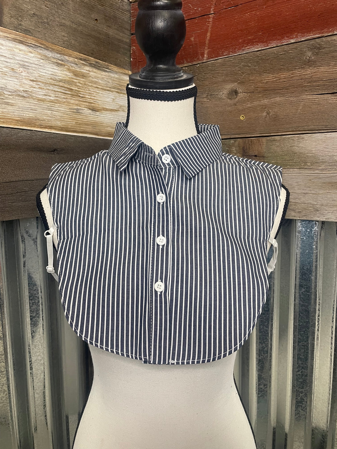 Striped shirt on a wooden surface with a rustic background
