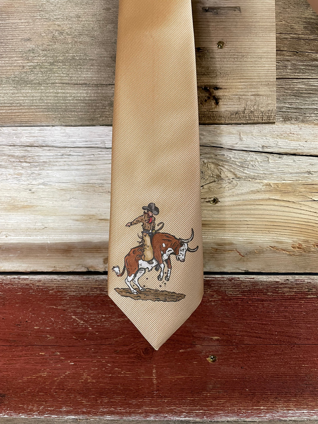 Beige tie with an embroidered design on a wooden background