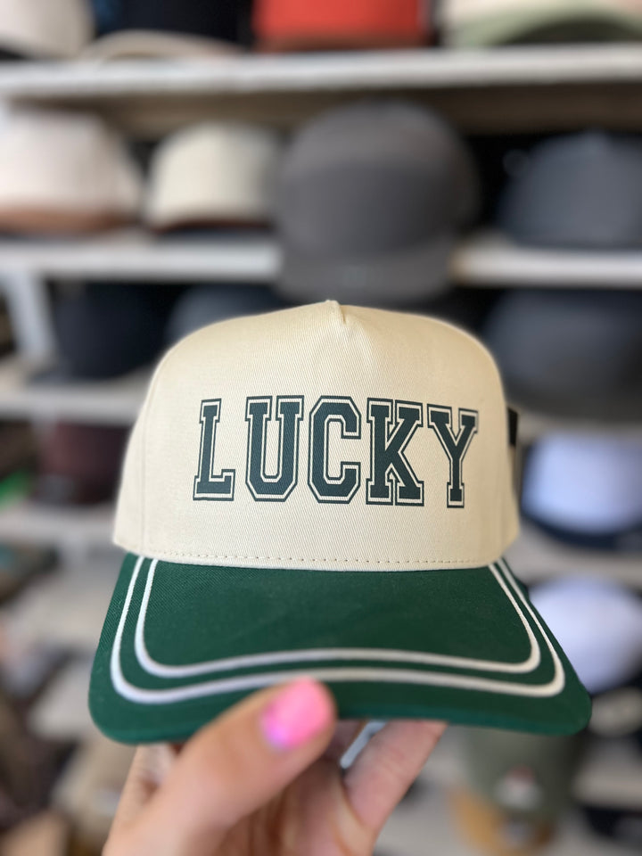 Green and beige cap with &
