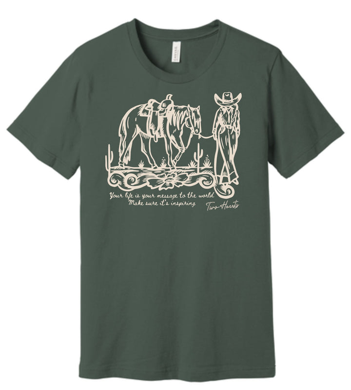 Green t-shirt with a graphic of a cowboy and horse and text on a white background